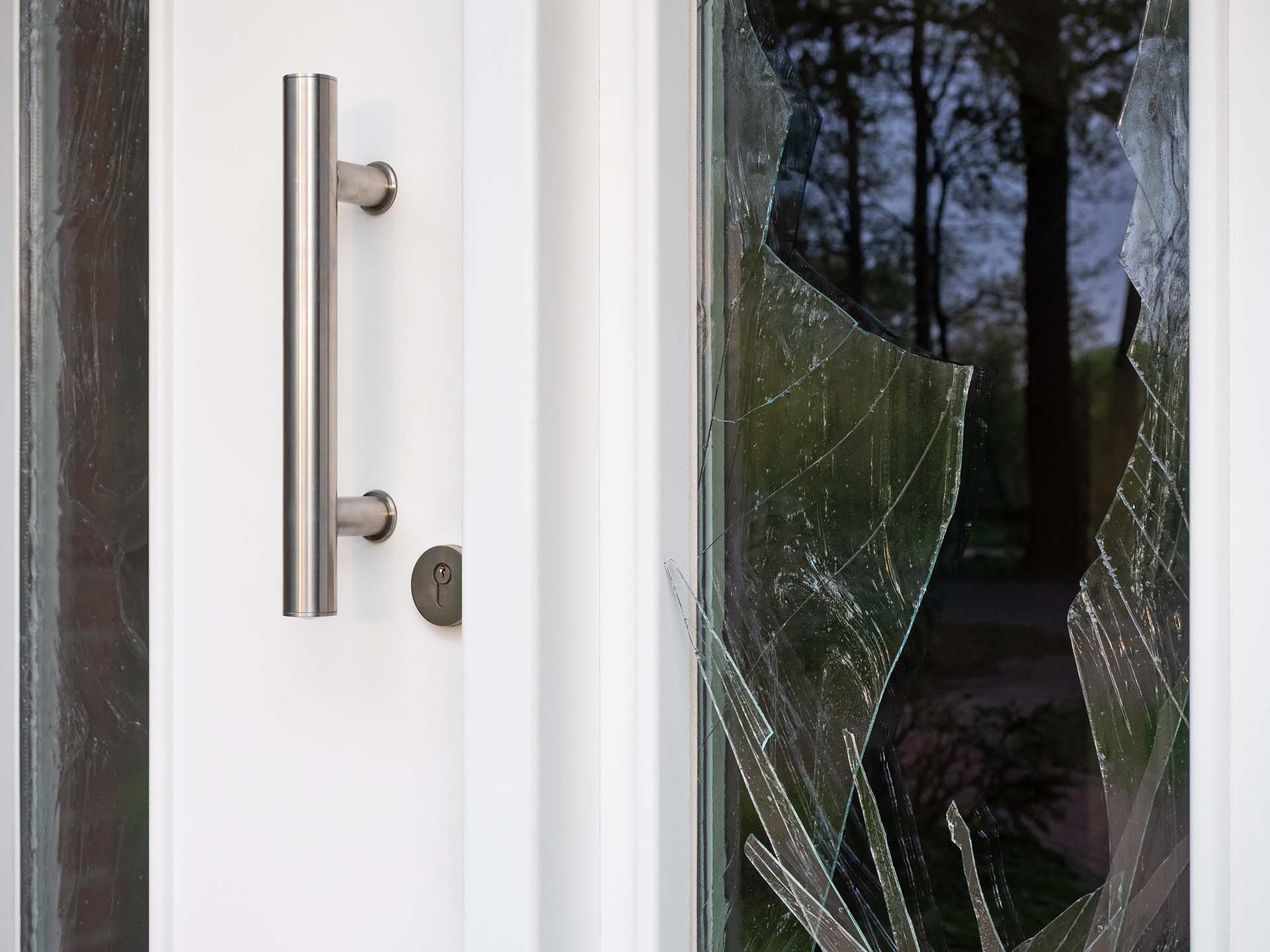 Broken front door and window