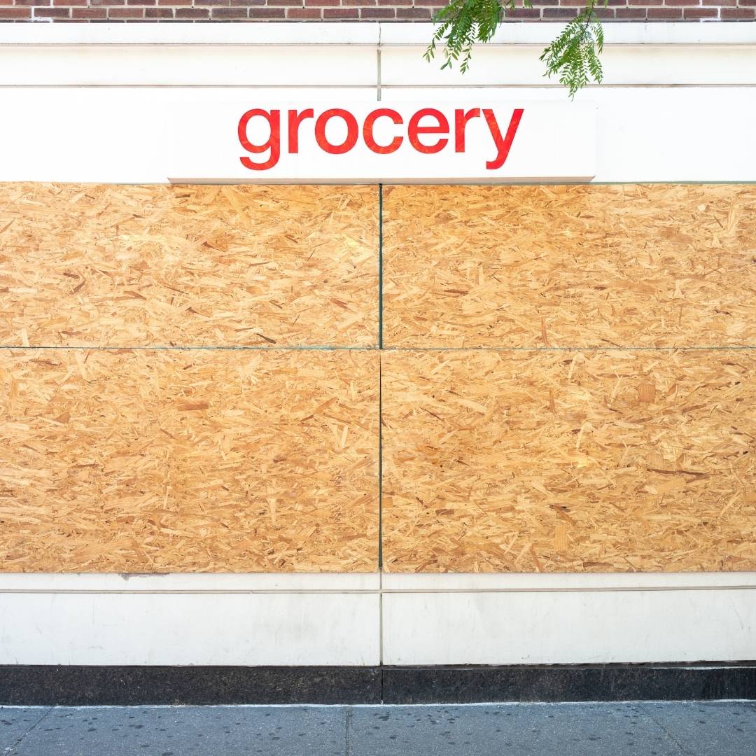 Shopfront windows boarded up in Hackney
